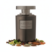 Frasco de perfume Portfolio Oriental Forest de Al Haramain, acabado bronce gunmetal, con notas de clavel, bergamota, cardamomo, canela, nuez moscada, ládano, gálbano, comino, cedro y mirra