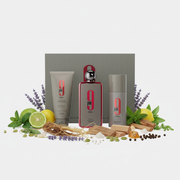 Afnan 9 PM Rebel Gift Set cu fundal alb și ingrediente în jurul bazei