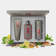 Afnan 9 PM Rebel Gift Set deschis cu fundal alb și ingrediente în jurul bazei