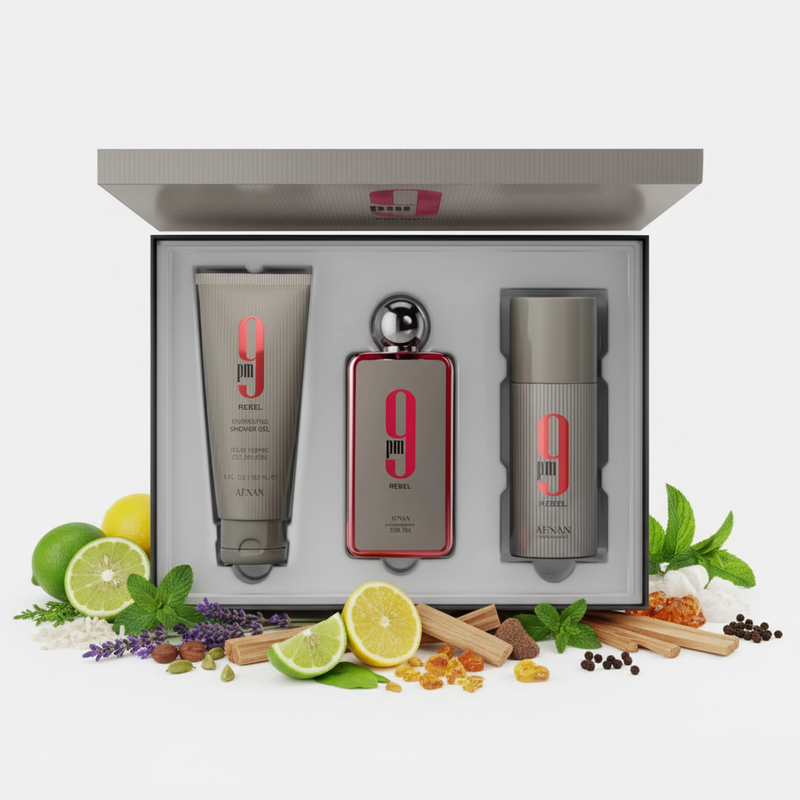 Afnan 9 PM Rebel Gift Set deschis cu fundal alb și ingrediente în jurul bazei