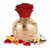 Frasco de perfume Lahdath de Lattafa EDP, botella esfera dorada con patrón grabado de hojas y paneles geométricos, etiqueta ovalada con caligrafía árabe LAHDATH, cuello dorado estrecho y gran tapón rosa roja mate en flor completa, sobre fondo blanco, rodeado de pétalos de rosa, limón, caramelo, vainilla, almizcle y cedro.