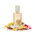 Perfume con notas de limón, almendra, coco, melocotón/albaricoque, flor de azahar, jazmín, nardos, rosa, vainilla, haba tonka, caramelo y almizcle